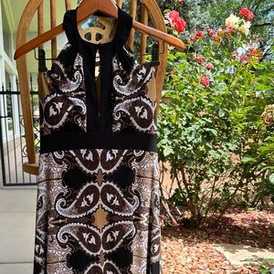 Festival fun black pattern dress. Keyhole neck open back. Size M.
